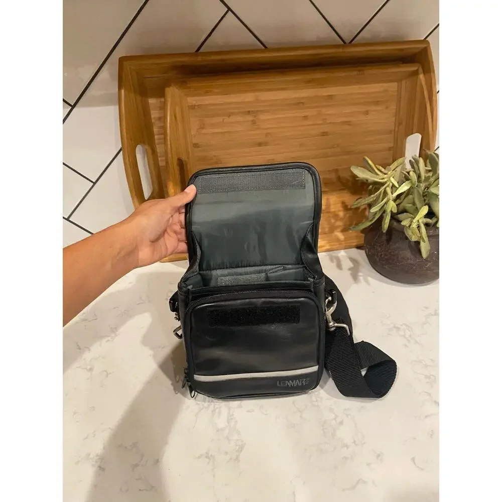 Lenmar faux leather shoulder camera bag hand held or shoulder strap vintage?